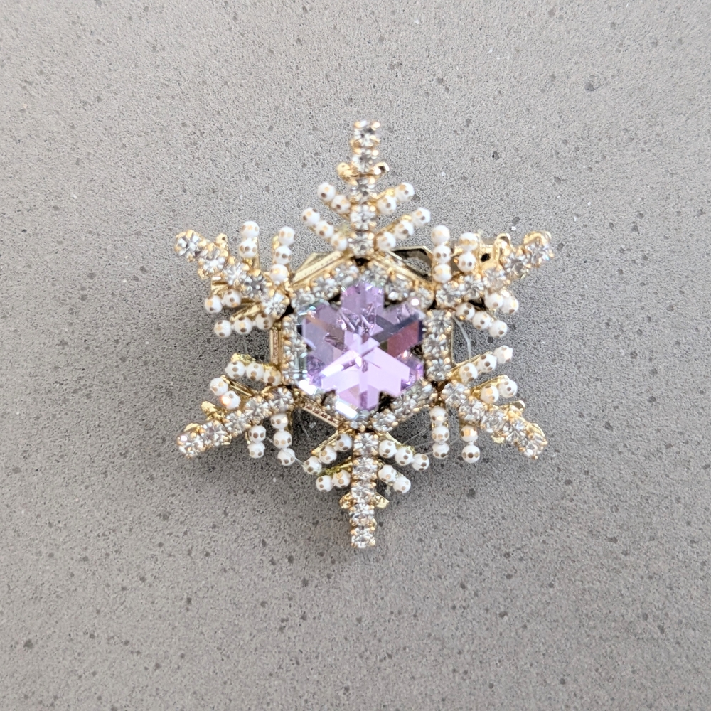 Elegant Gold and Silver Snowflake Brooch